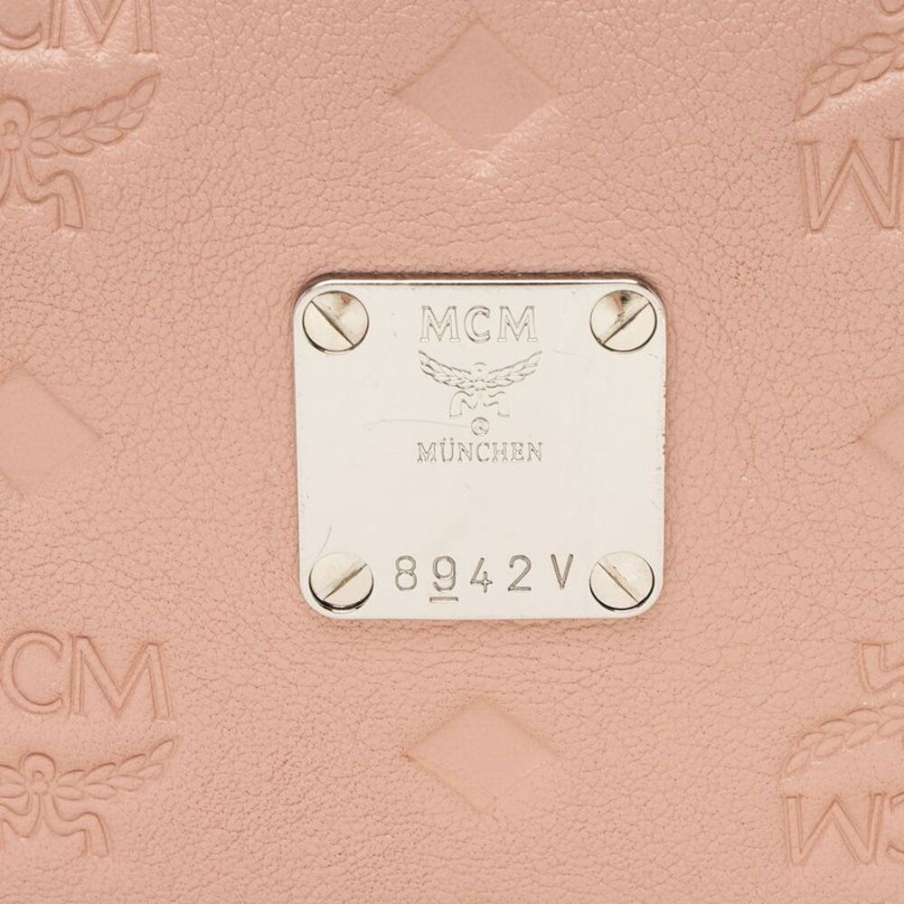 Mcm Embossed Leather Small Backpack - image 8